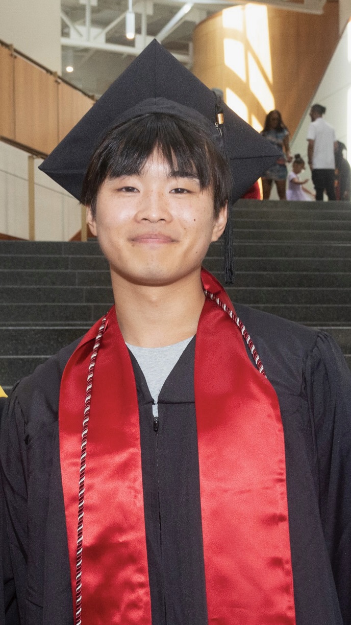 a picture of erik chou at graduation